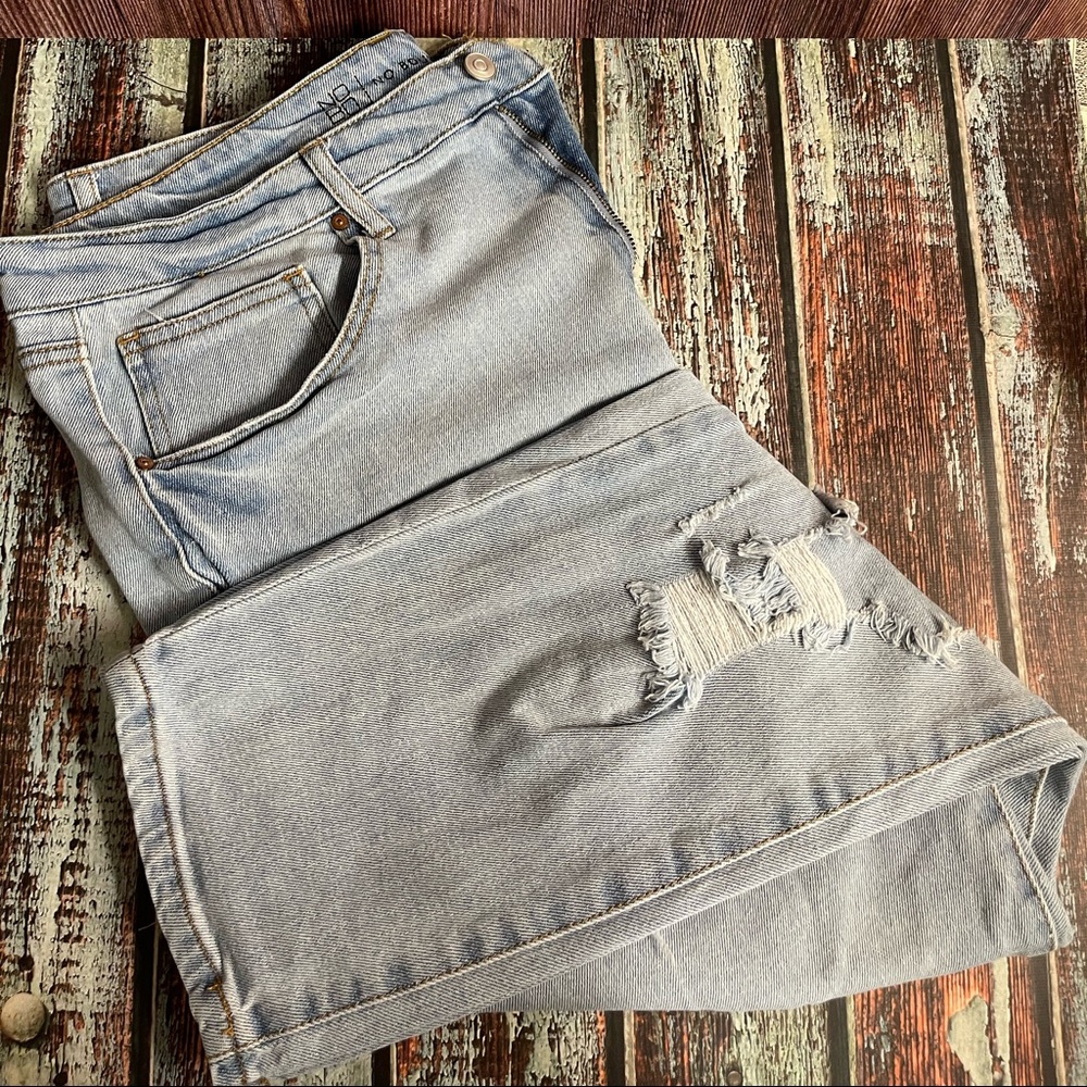 Ripped, faded wash Mom Jeans